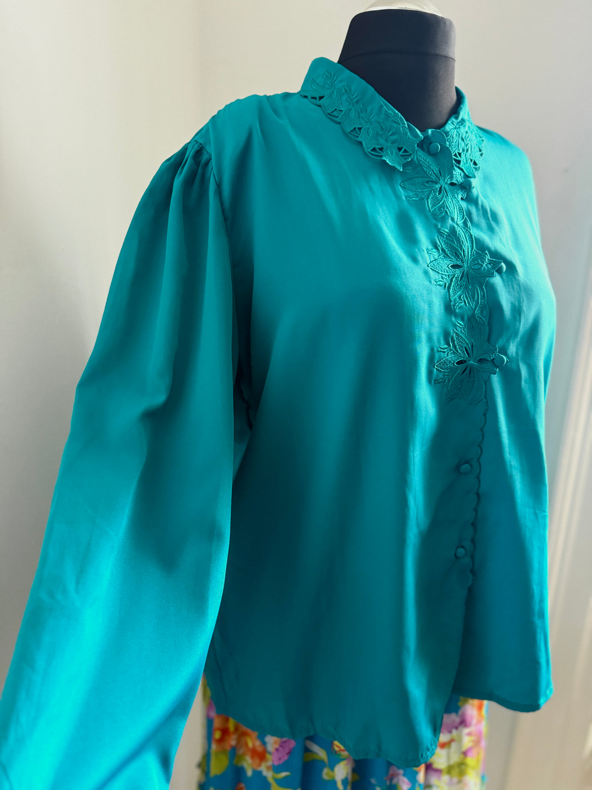 80s turquoise cut out detail blouse.