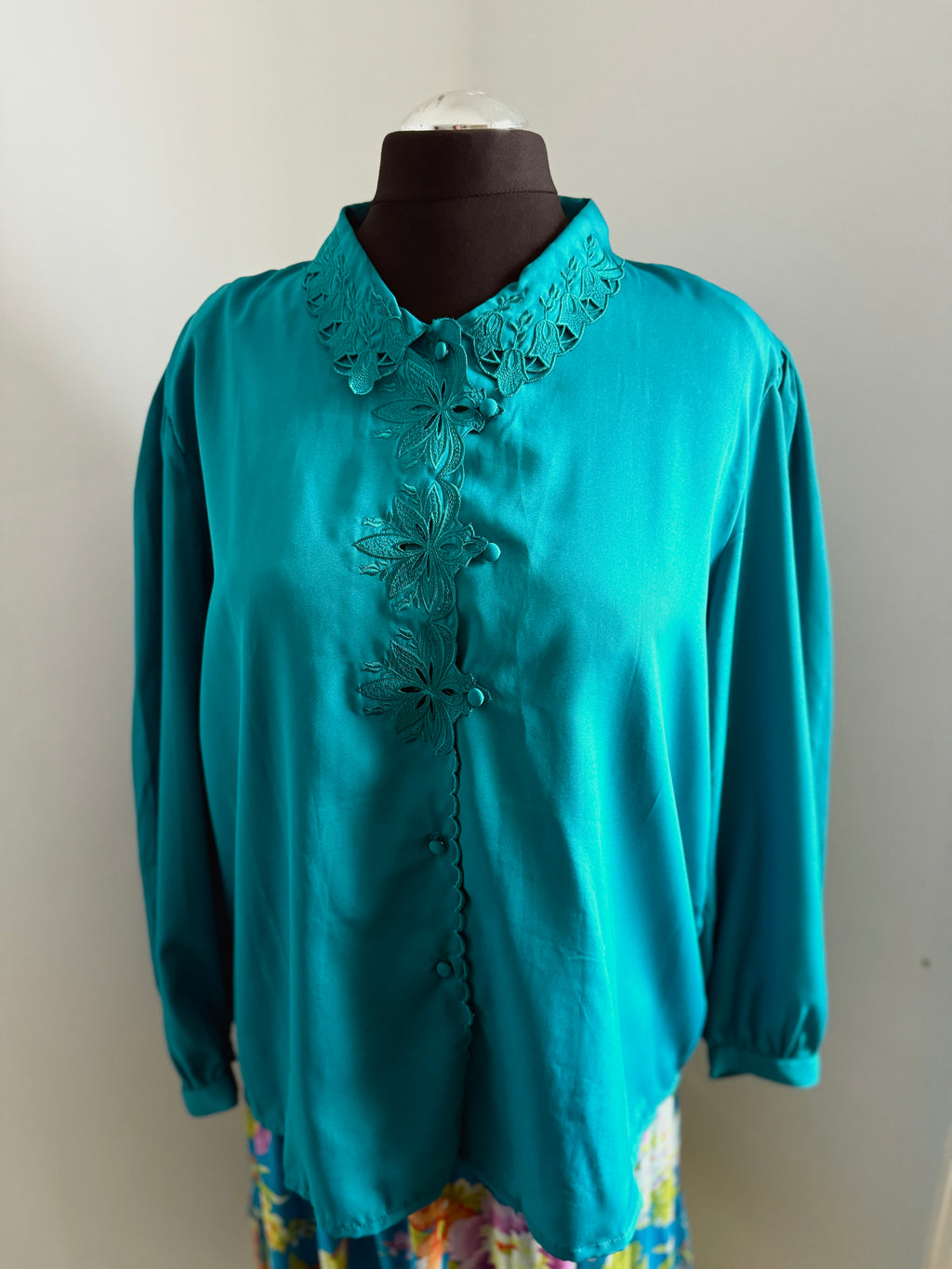80s turquoise cut out detail blouse.