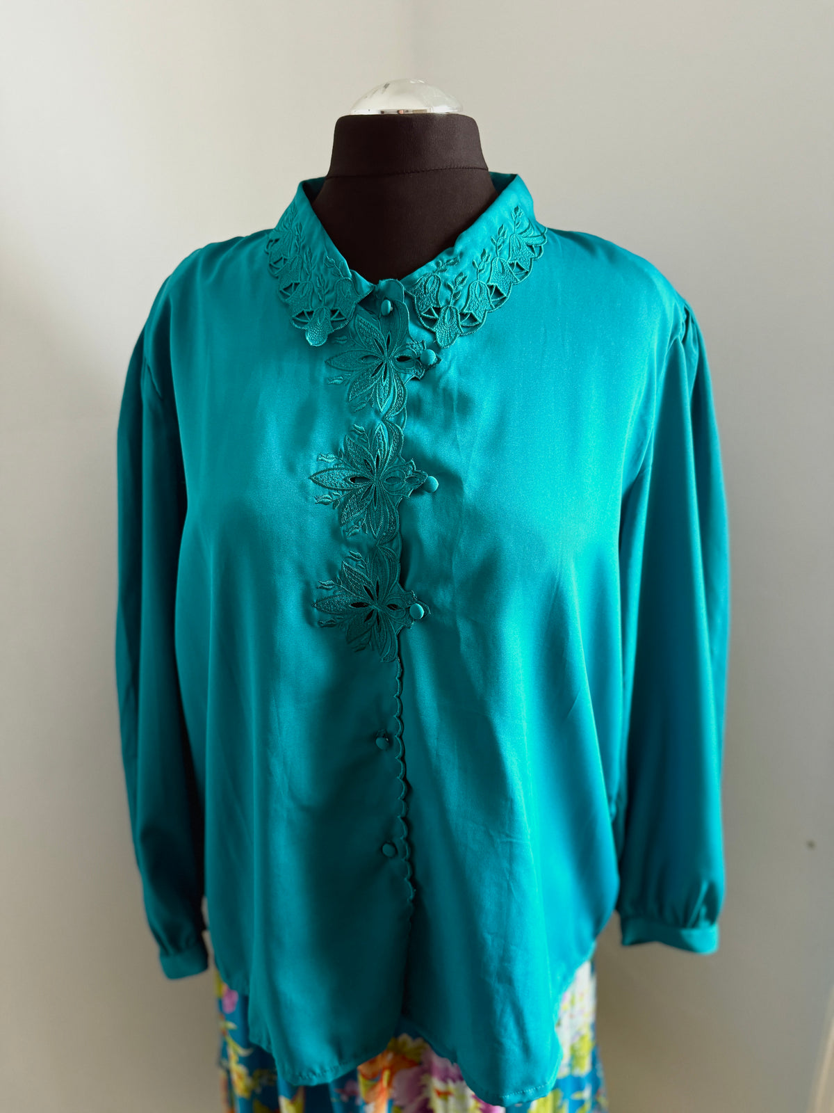 80s turquoise cut out detail blouse.