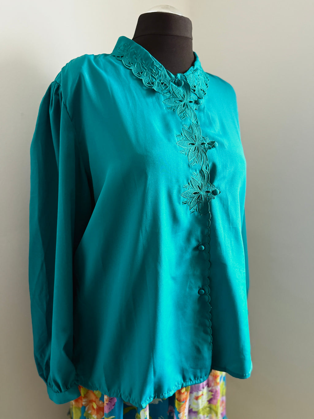 80s turquoise cut out detail blouse.