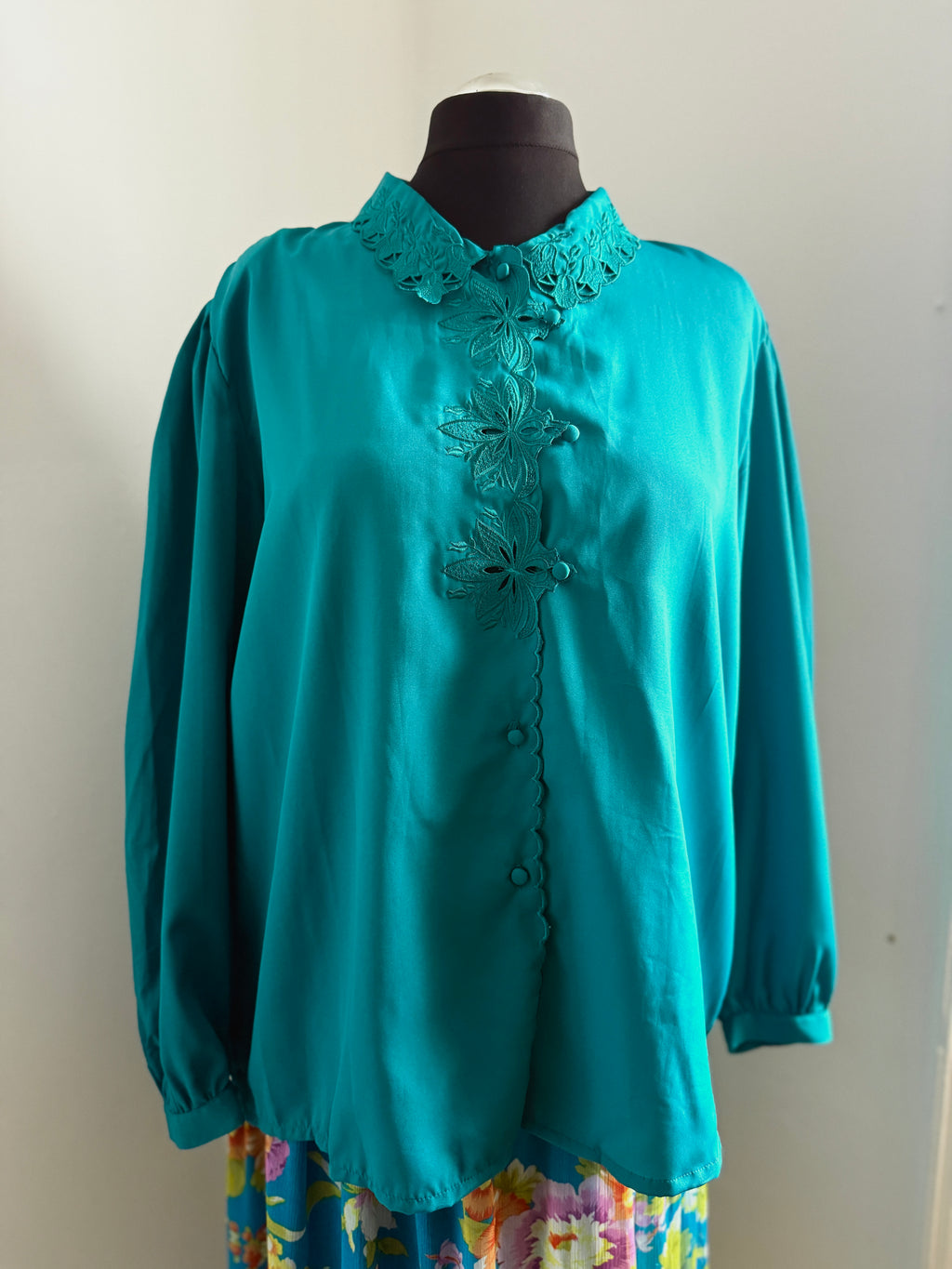 80s turquoise cut out detail blouse.